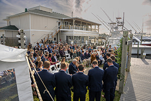 Looking out over an outdoor ceremony at  the Hatteras Marlin Club.